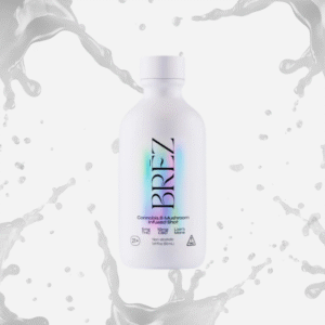 A single small and white bottle, BREZ Cannabis & Mushroom Infused Shot containing THC, CBD, and Lion's Mane. With light grey liquid splashes in the background.