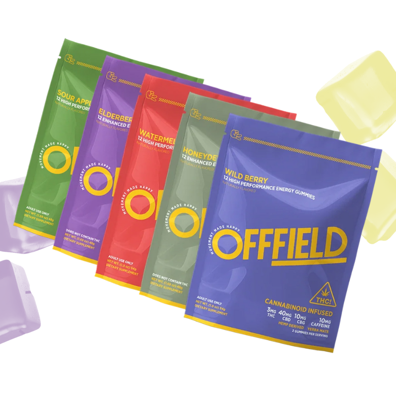Five colorful packs and different flavors of Offfield High Performance Energy Gummies, they are in front of purple and yellow gummies in the background.